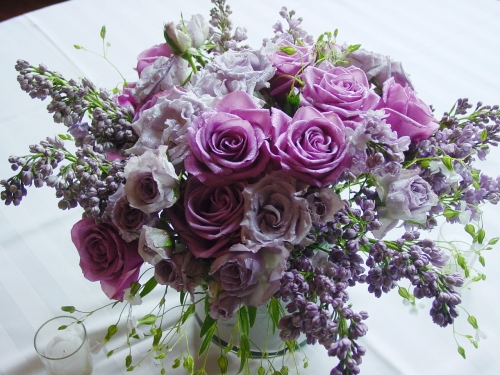  Blue roses and Blue Bird roses formed this gardeny lavender centerpiece