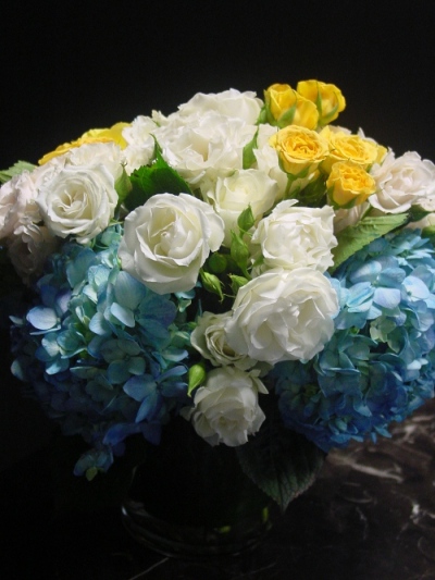 Charthouse wedding centerpieces yellow white and blue