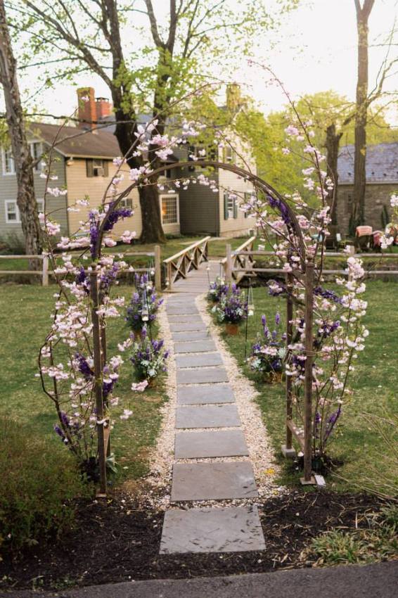 Wedding ceremony arch of cherry blossoms by Limelight Floral Design hoboken jersey city wedding florist
