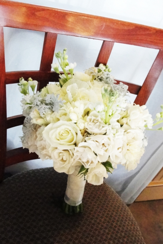 bridal bouquet gray and white with roses, kale and stock